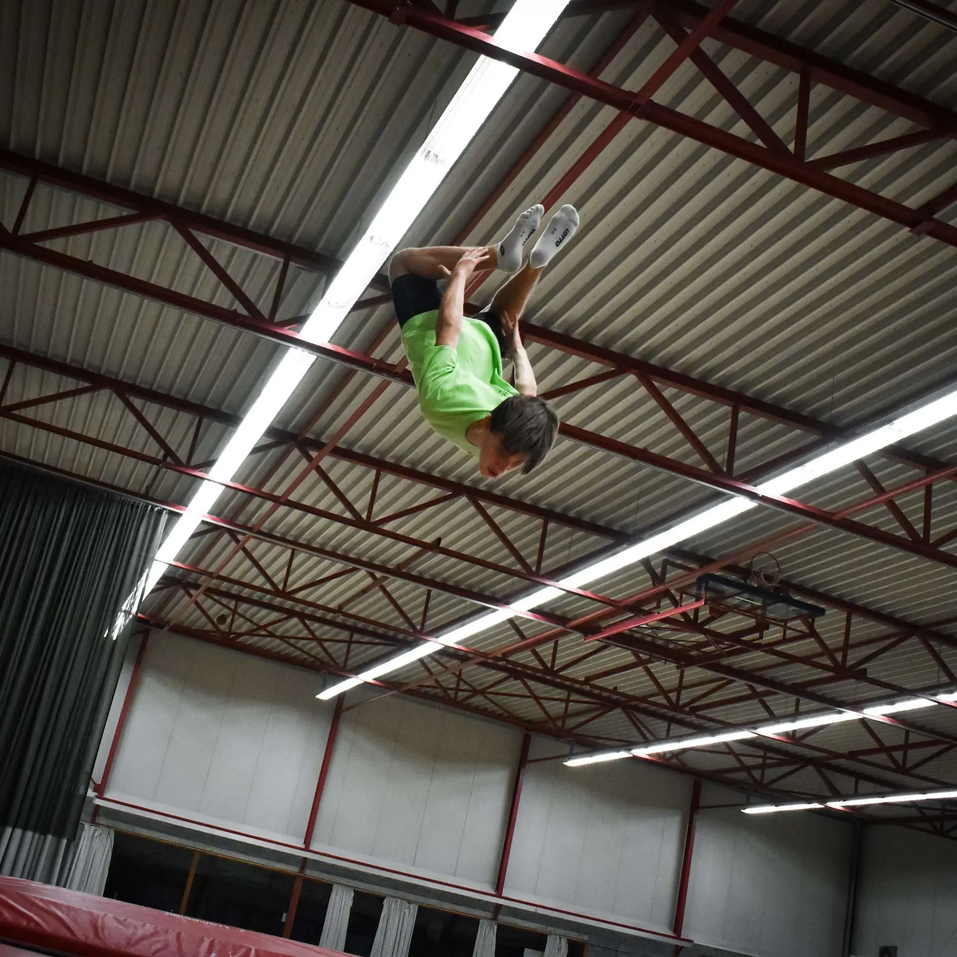 Trampoline jumping during gymnastics training